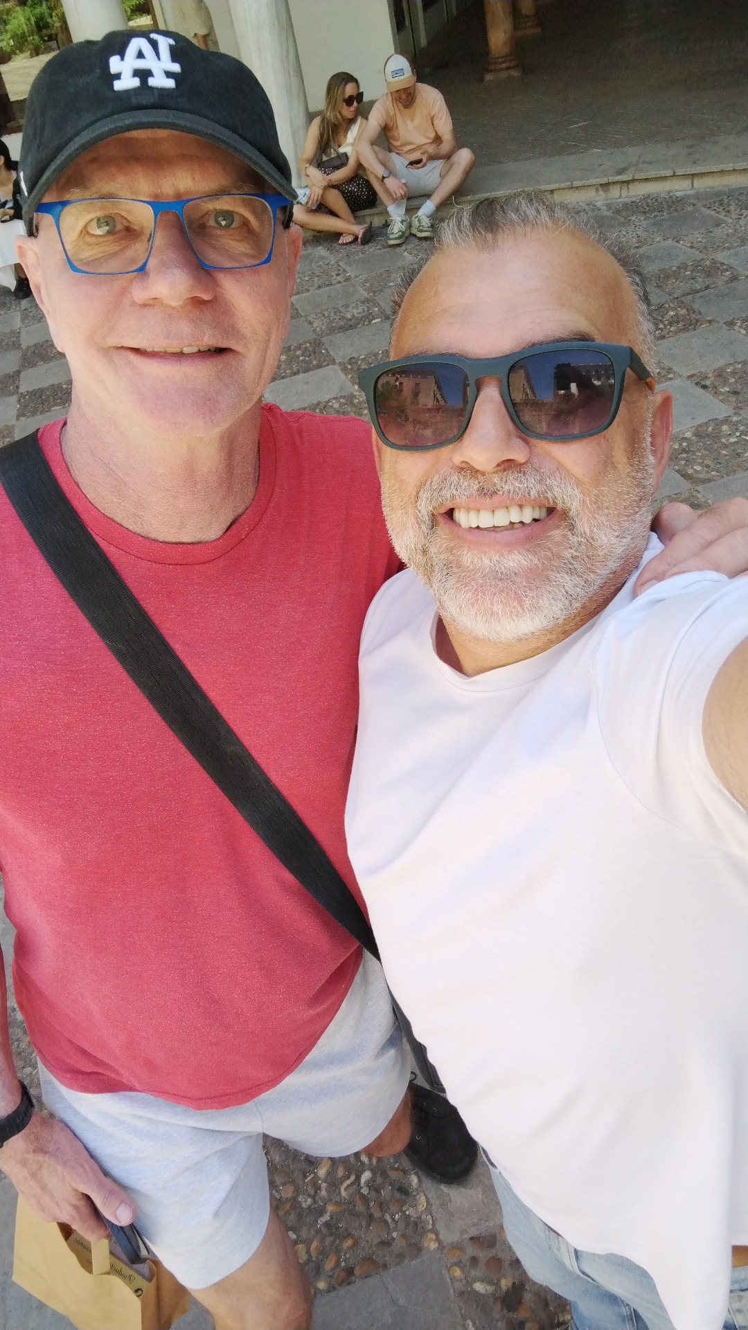 Johnny with a guest at a Sevillian patio