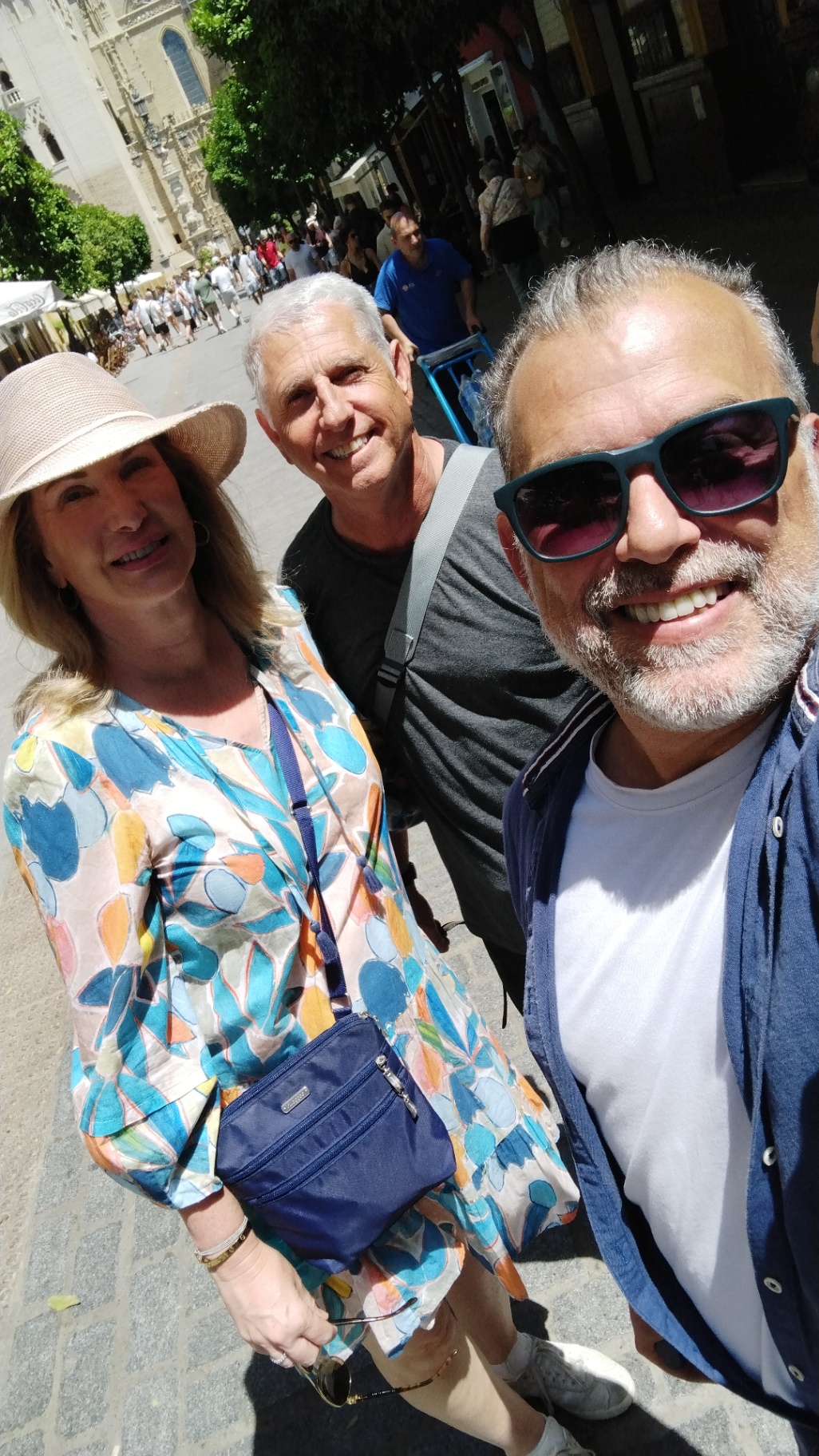 Johnny with guests near Seville Cathedral on a sunny day