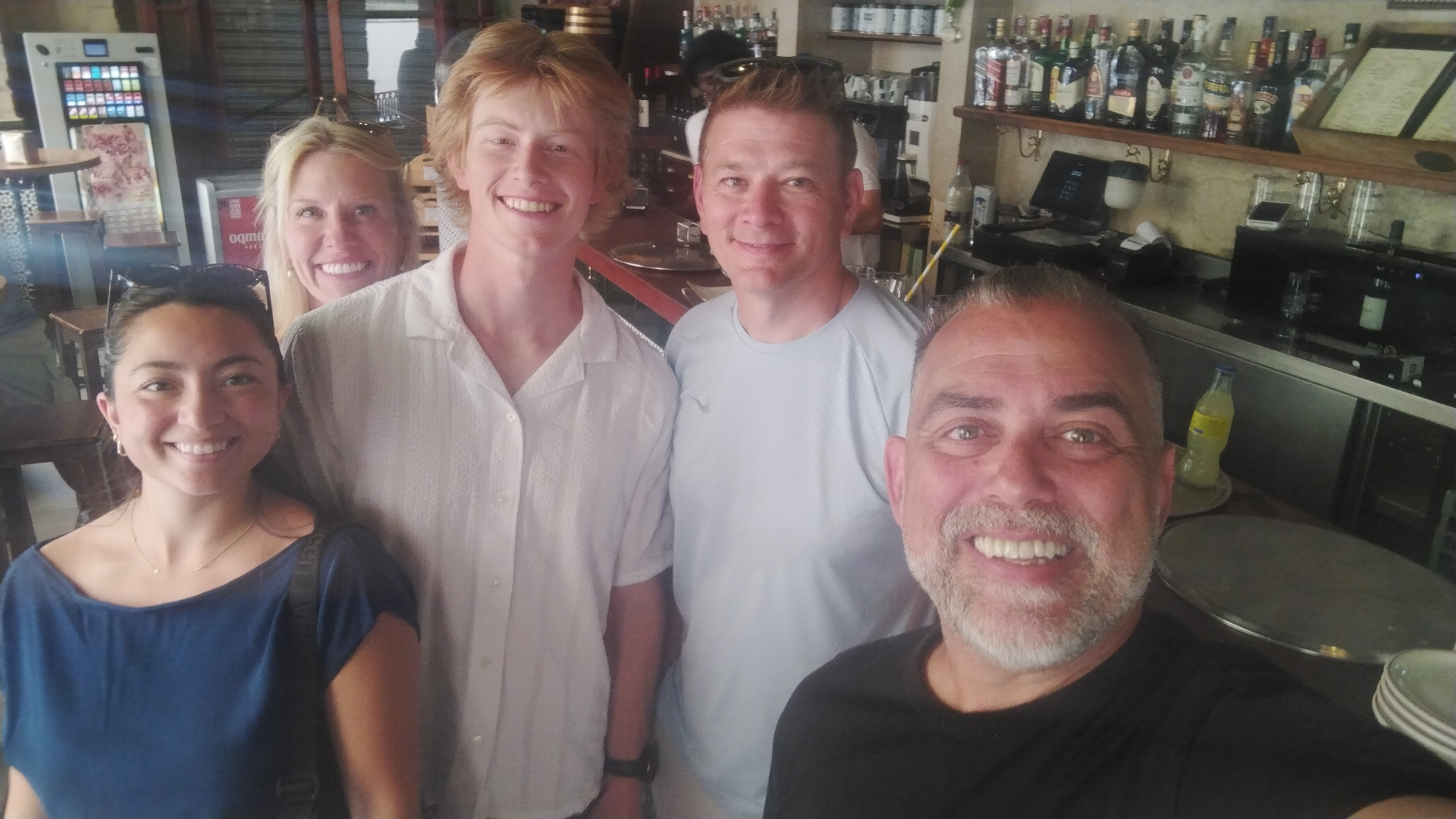 Johnny with a family group at a local tapas bar in Seville